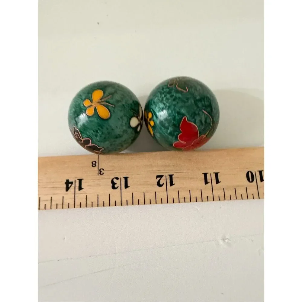pair of vintage cloisonne enamel musical massage balls with floral designs